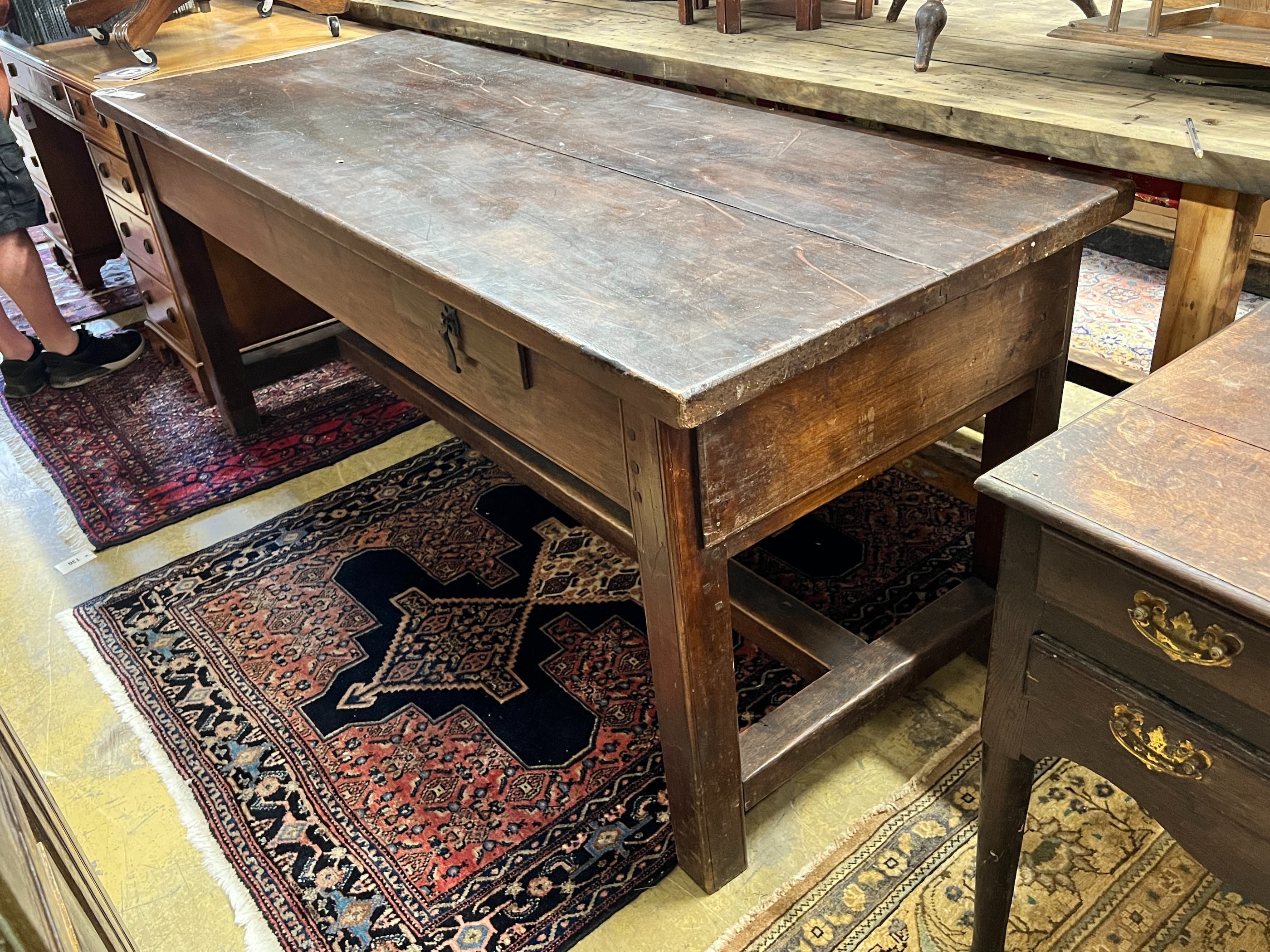 A 19th century French plank top rectangular extending kitchen table, length 190cm, width 72cm, height 78cm